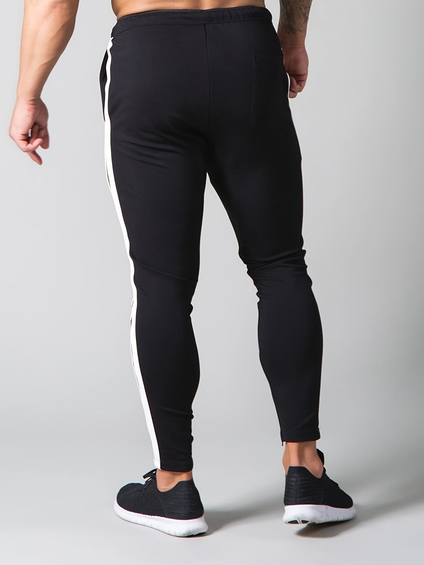 Tapered Trackpants met Zijstrepen | Slim Fit Gymwear | Stretch Comfort