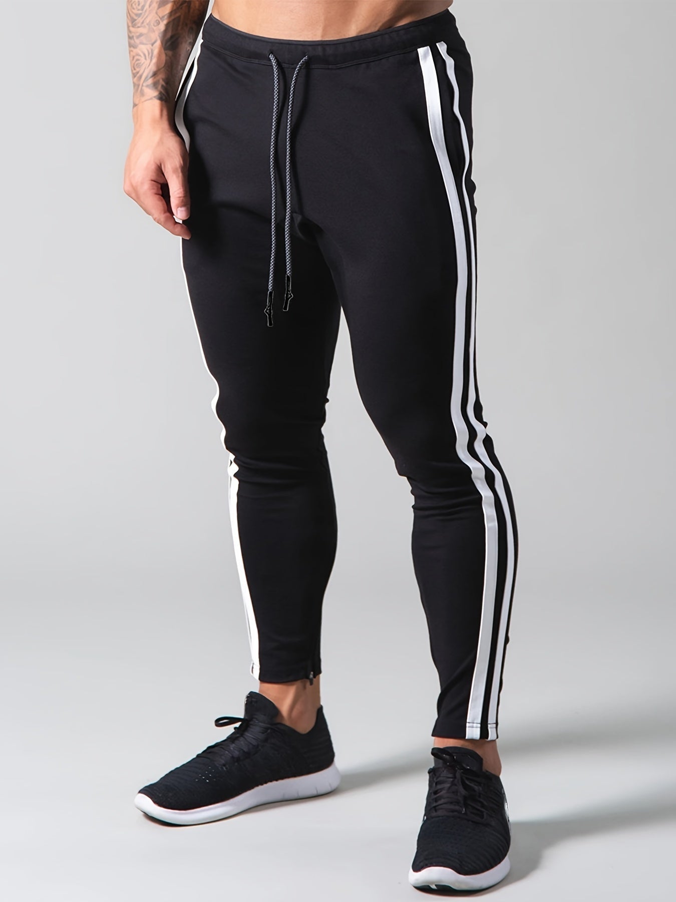 Tapered Trackpants met Zijstrepen | Slim Fit Gymwear | Stretch Comfort