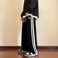 Unisex Wijde Trainingsbroek | Streetwear | Zijstrepen