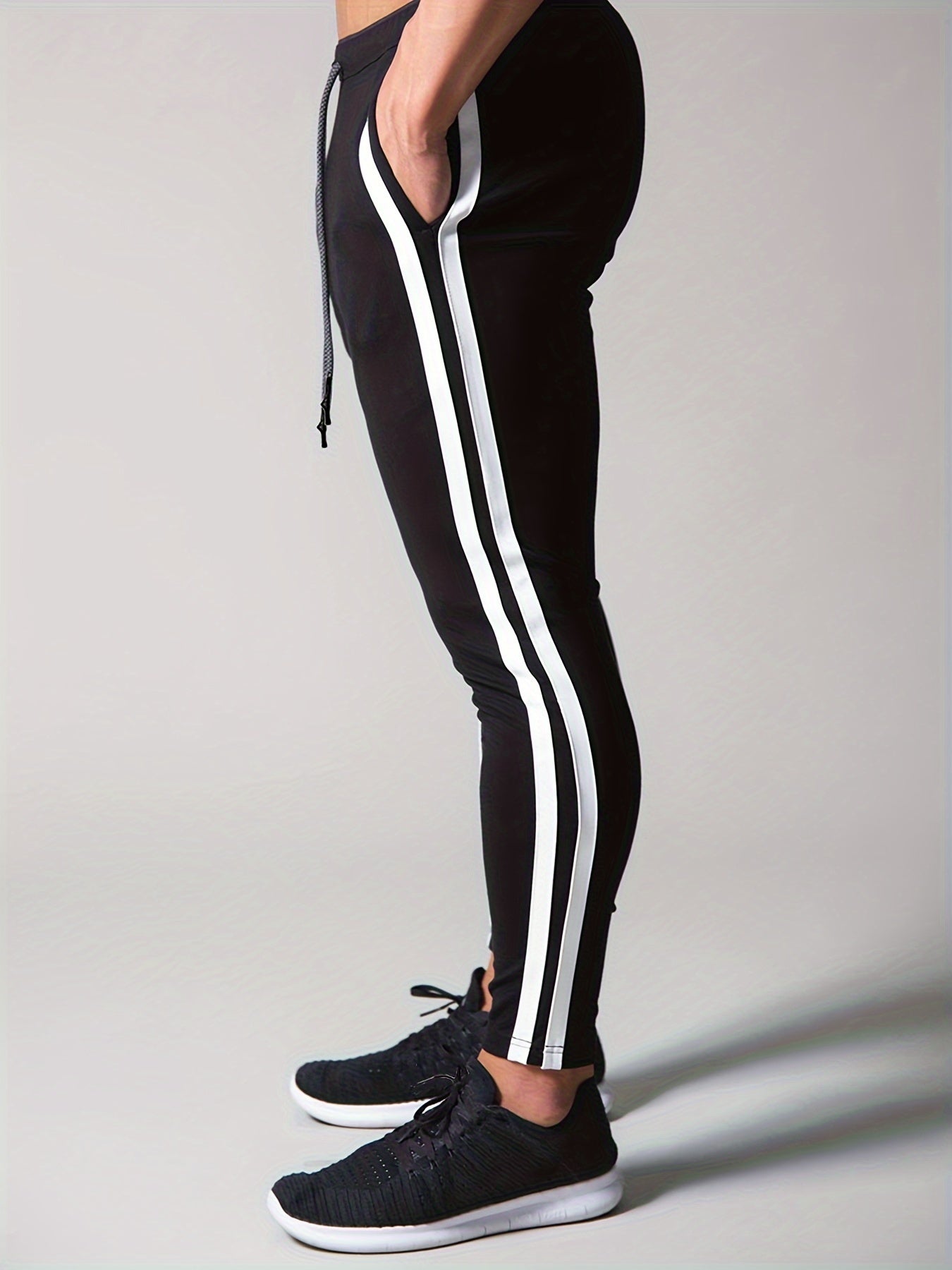 Tapered Trackpants met Zijstrepen | Slim Fit Gymwear | Stretch Comfort